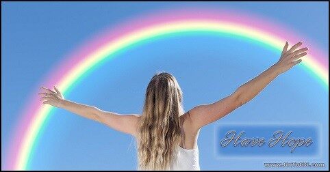 Women looking at rainbow on blue sky with words have hope